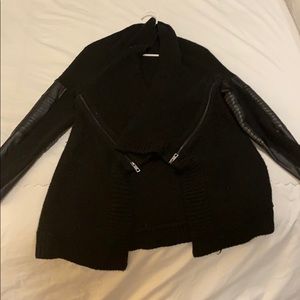 Black sweater with leather sleeves